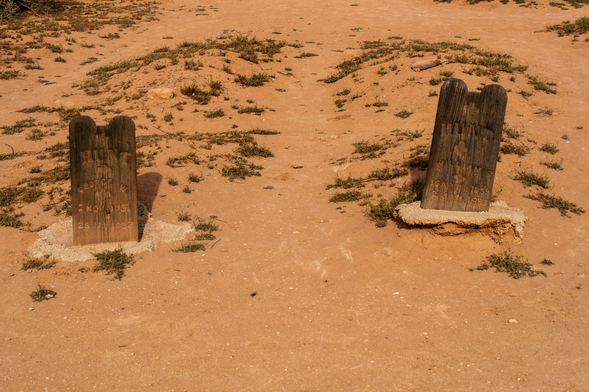 A Desert Ghost Town Cemetery (two old stones)