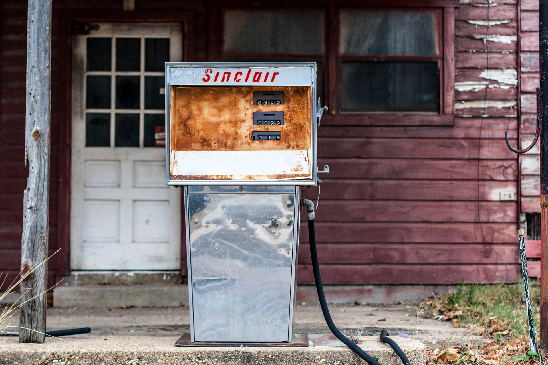 Kosse, Texas - Old Gas Pumps Gas Station (rust pump far)