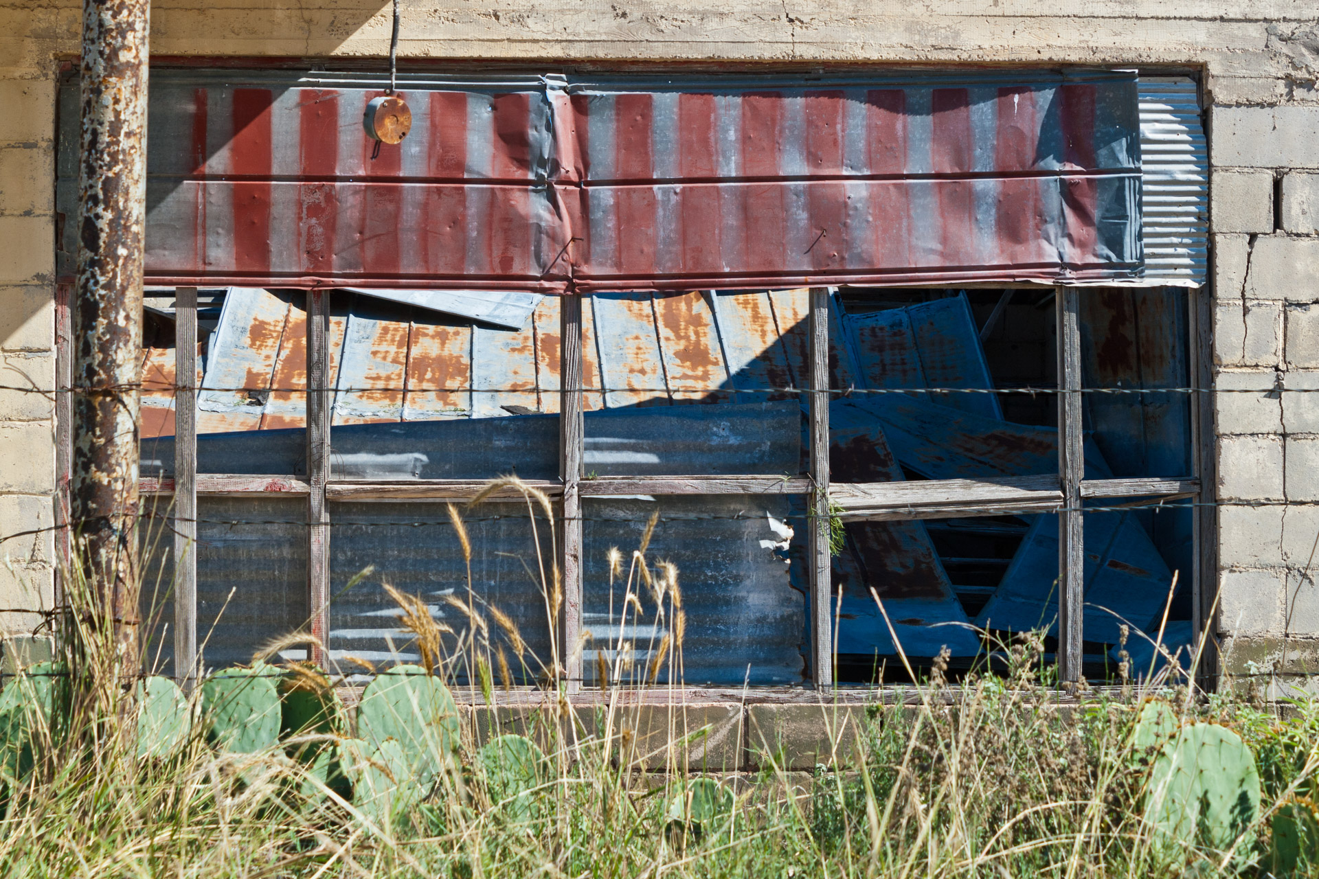 Talpa, Texas - The Falling Tin Store (window)