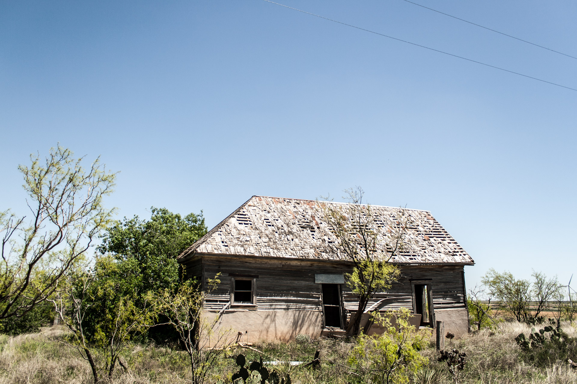 Wind Turbine Community Wooden House (left)