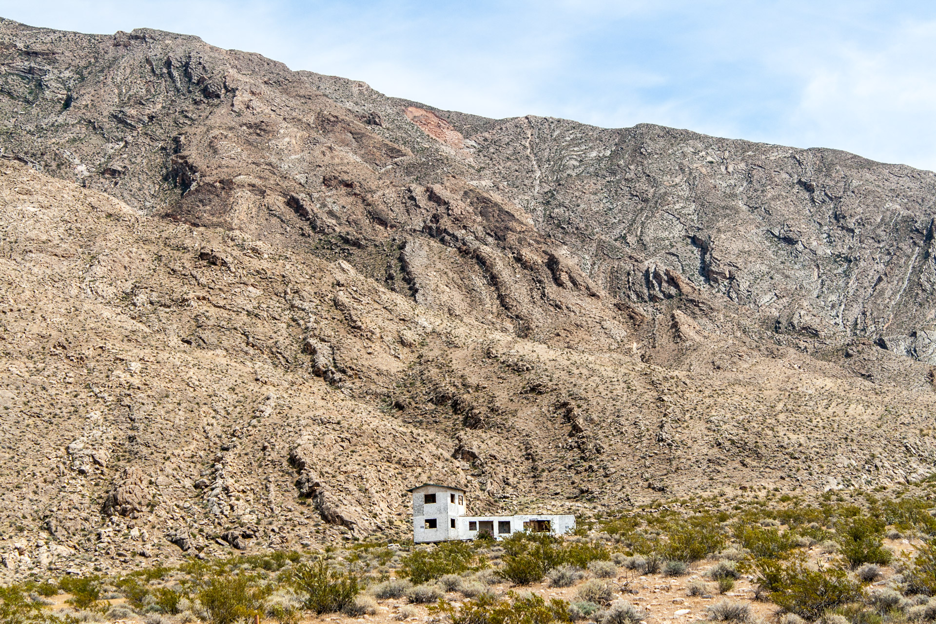A Lonely Desert Mountain House (front mid center)