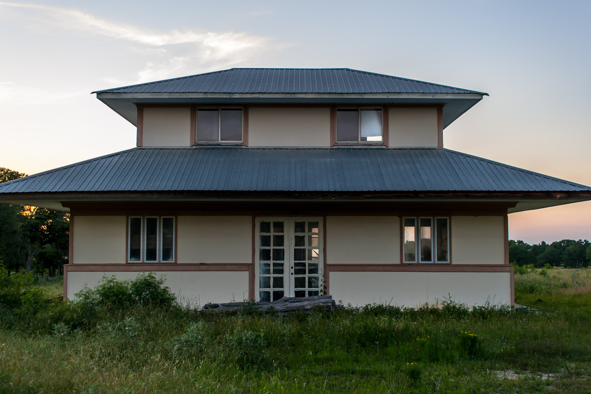 Sunset At A Tiered Roof House (front close)